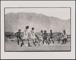 Soccer players from two of the sixteen teams comprising the Hispanic Soccer League compete, Las Vegas, Nevada: black-and-white photographs