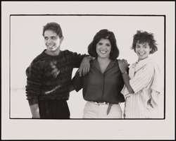 Siblings David Carrero, Doris Rodriguez, and Yvette Carrero stand together (identified from left to right): black-and-white photographs