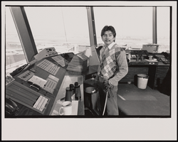 Mark Rios, Air Traffic Controller, stands in the control tower at McCarran International Airport in Las Vegas, Nevada: black-and-white photographs