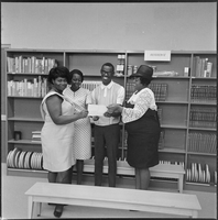 Set of photographs including Boy Scout Leaders at Doolittle, award assembly, adult graduation at Highland, Addie Reid Blake family, and James Daniels,1968