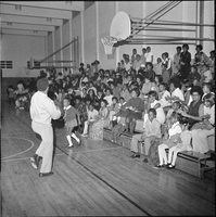 Set of photographs including Cosmetique installation, Tony McCormick, Checkmates at Doolittle, Edna Ford, and Moulin Rouge Barber Shop
