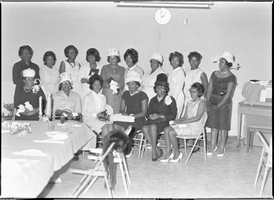 Set of photographs including baseball at Doolittle (Mrs. Viola Johnson throws out first ball), Mother's Club banquet, basketball champions honored at Doolittle