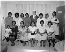 Set of photographs including council meeting at Madison, Tony McGlothin at Fashion show at Jefferson day care, 49er basketball champions