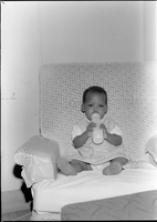 Set of photographs including talent show at Doolittle, and Nat Johnson's baby