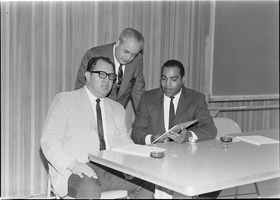 Set of photographs including civil rights meeting at Doolittle (April 14), Leed's Shoe Store advertisement, and Ruben's birthday party