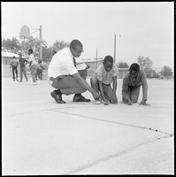 Set of photographs including KTOO, Elder Trent at KTOO, Ray Blanks at Juvenile Home, Mullin at Doolittle, Scout meeting at Matt Kelly, ballet at Highland, Jo Mackey at Colonel Franks, and marble game at Westside