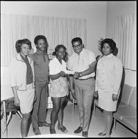 Set of photographs including COGIC Banquet at Caesars Palace, State Convention 70, and scholarship award at Matt Kelly for Booker