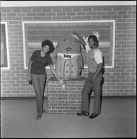 Set of photographs including Barbara Jean's house, Doolittle: Pop Warner swim party, "Potato man," and Food Fair manager