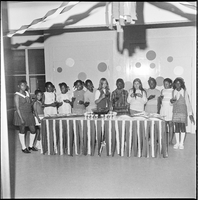 Set of photographs including Mr. & Mrs. Al Sawyer, Mr. & Mrs. Miller, 6th grade social at Doolittle, baby contestants at Powerhouse Church, Mrs. Helen Anderson, and clean-up trucks in Vegas Heights