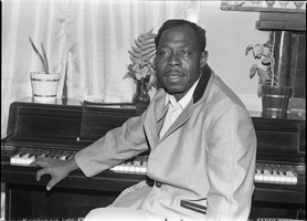 Set of photographs including George Holmes, Coluth's birthday, the Winford's housewarming, AM and M Choir, Curtis Miltonett Singers: image 001