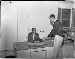 Set of photographs including Larry and Joe at Doolittle, and basketball team: image 001