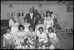 Set of photographs including Doris Tina Bond's baby, Happy Times Girls at Ellen's, Minnie Wilkins painting, Shrines Conclave, Lonnie Lawson Sam, and Wild Goose advertisement: image 001