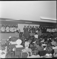 Set of photographs including Victory Baptist Choir, Love's Cocktail Lounge, Easter Program at Upperoom, and basketball tournament at Doolittle: image 001