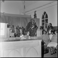 Set of photographs including Ivy Wheeler, North American Finance office, and Ernestine Revival and street service: image 001