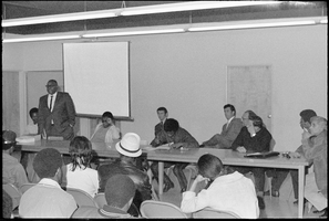 Set of photographs including drugs and narcotics clinic at Concentrated Employment Program, mountain, Hermina's party, and Jerry's Nuggett sign: image 001