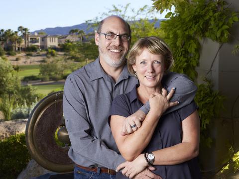 Jim Mason and his wife outside of the family home in Las Vegas, NV.
