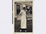 Nat Hart in a chef's hat sipping from a sauce pot, circa 1950
