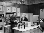 Muriel Stevens cooking with a guest on her tv show, circa 1975