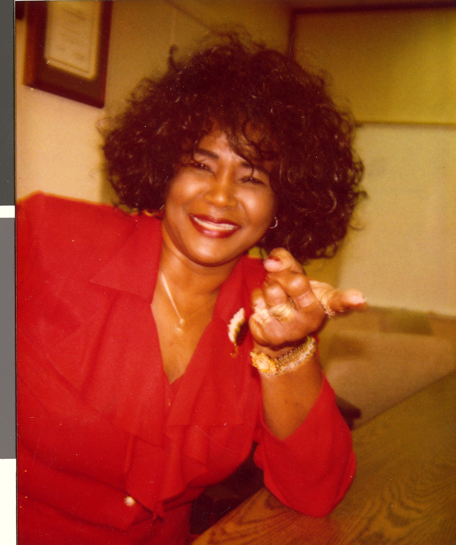 Marzette Lewis at her desk, Image 03