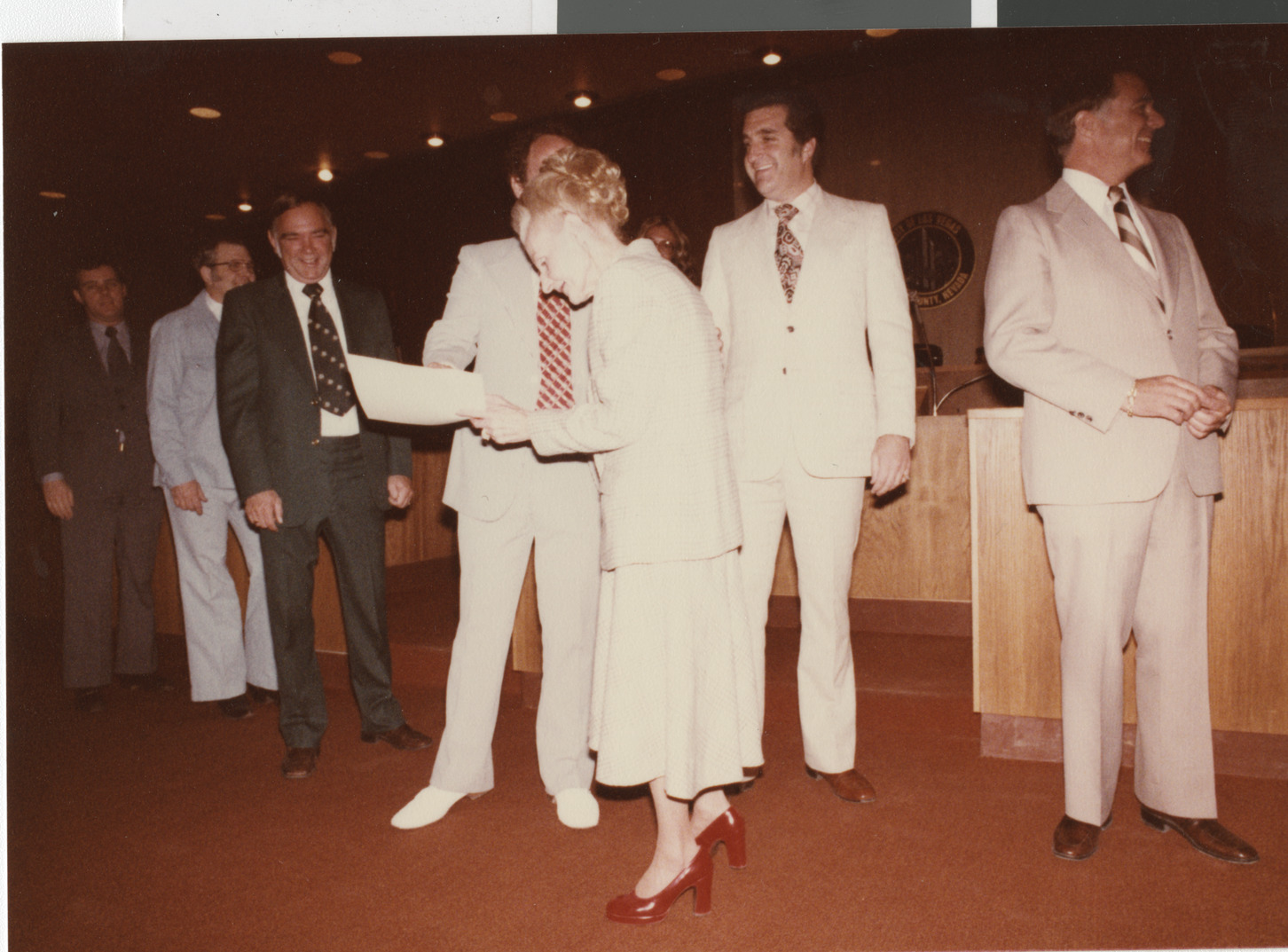 Photograph of Ron Lurie presenting certificate, circa 1978