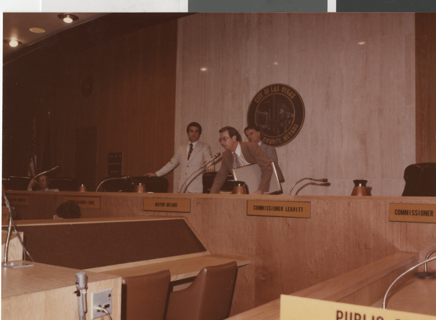 Photograph of Ron Lurie and others presenting plaque, circa 1978
