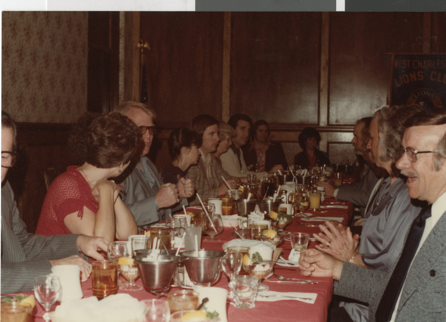 Photograph of Ron Lurie with others at a banquet table