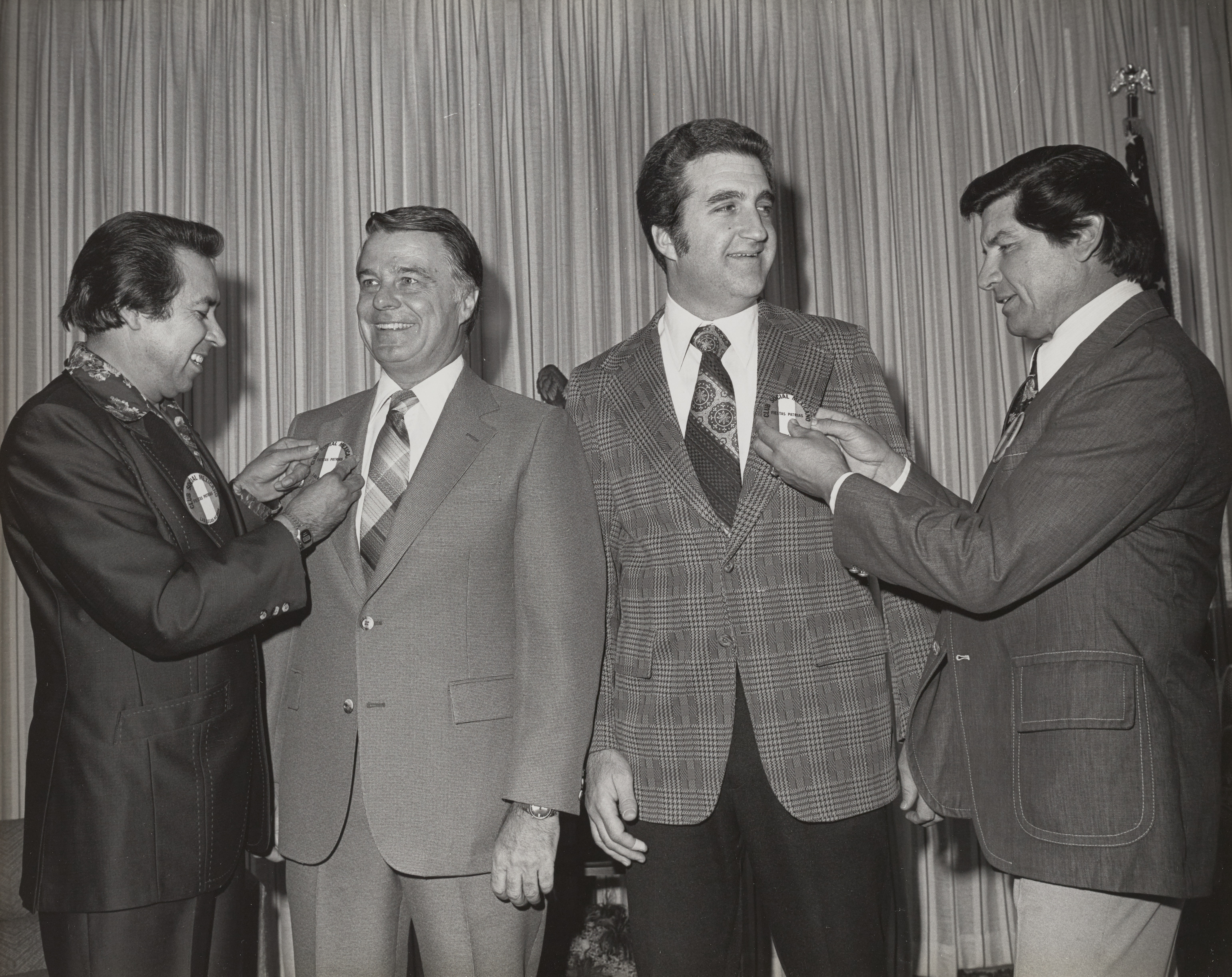 Photograph of Ron Lurie and Mayor Briare receiving pins from Club Social Mexicano