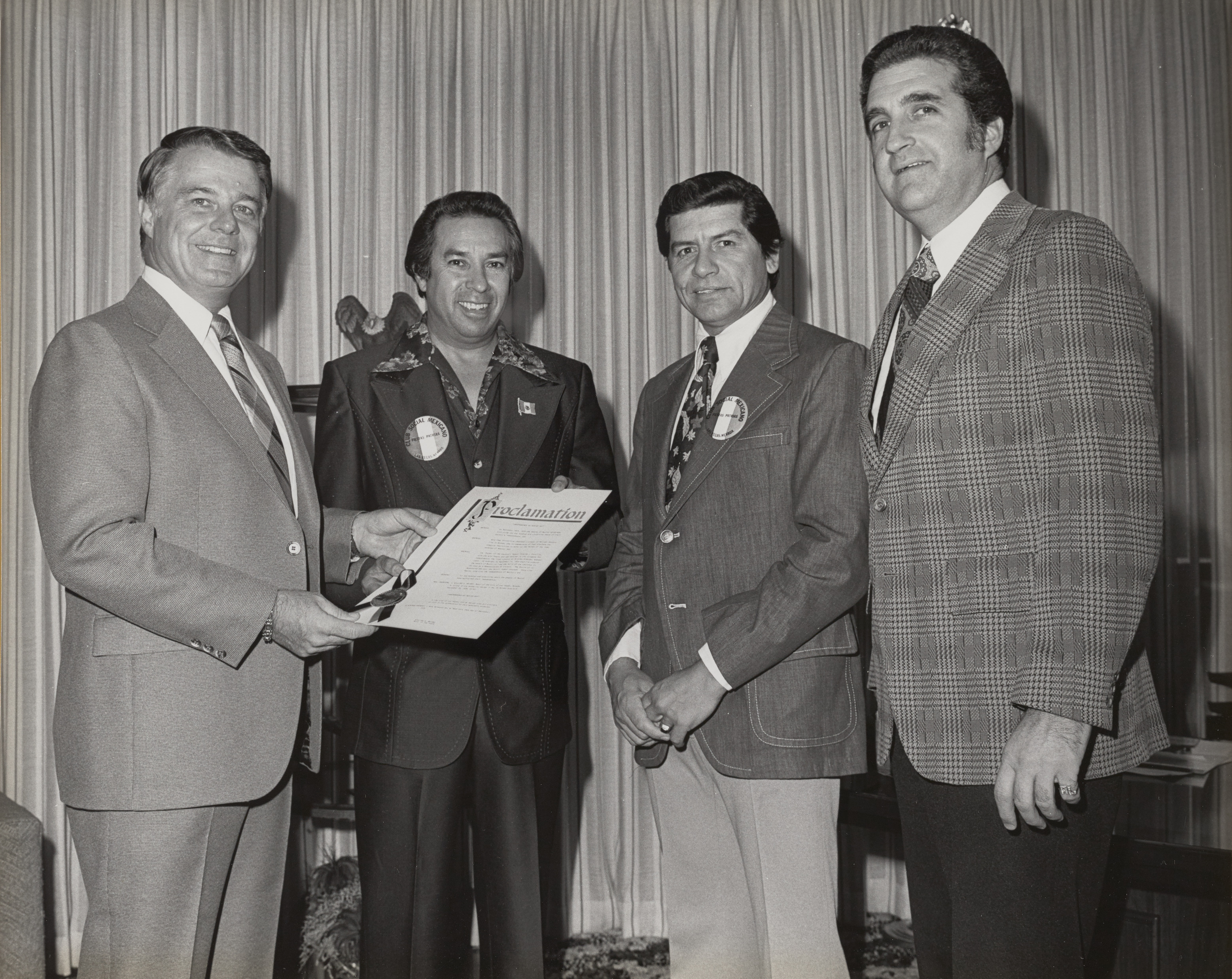 Photograph of Mayor Briare and Ron Lurie giving Proclamation to members of Club Social Mexicano