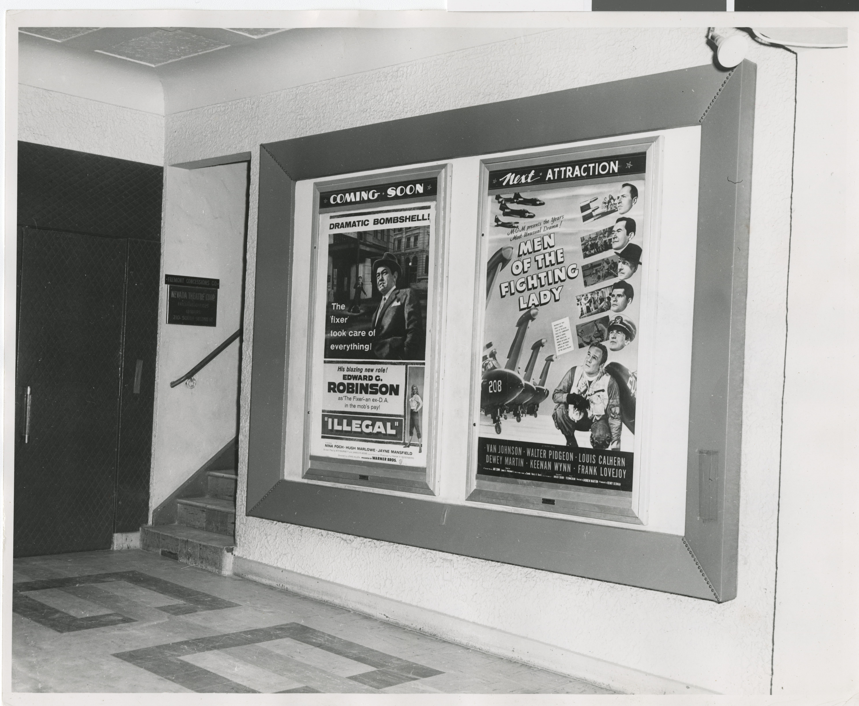 Photograph of interior of Guild Theater billboards