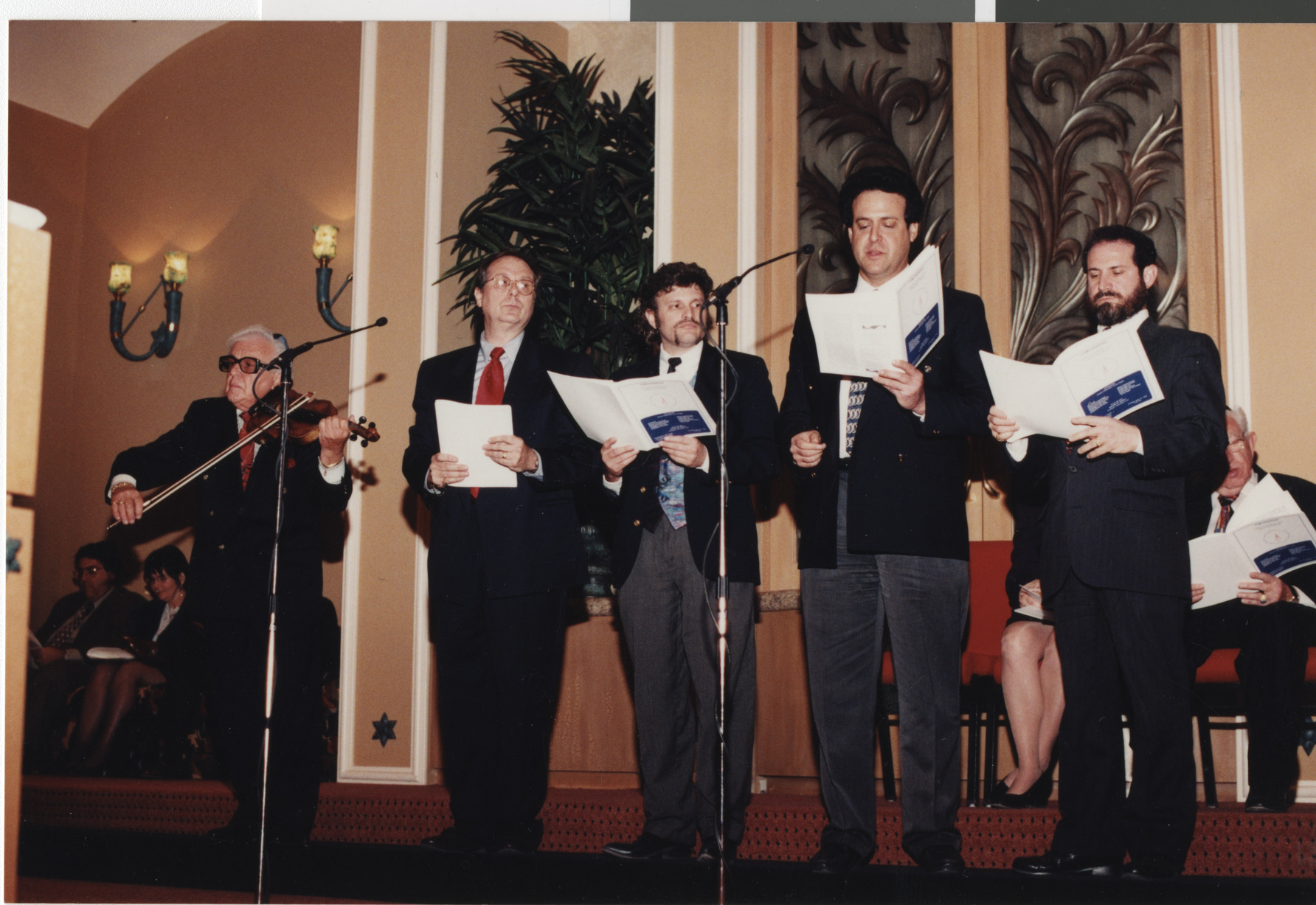 Photograph of Congregation Ner Tamid during Yom Ha' Shoa (Holocaust Remembrance Day), 1999