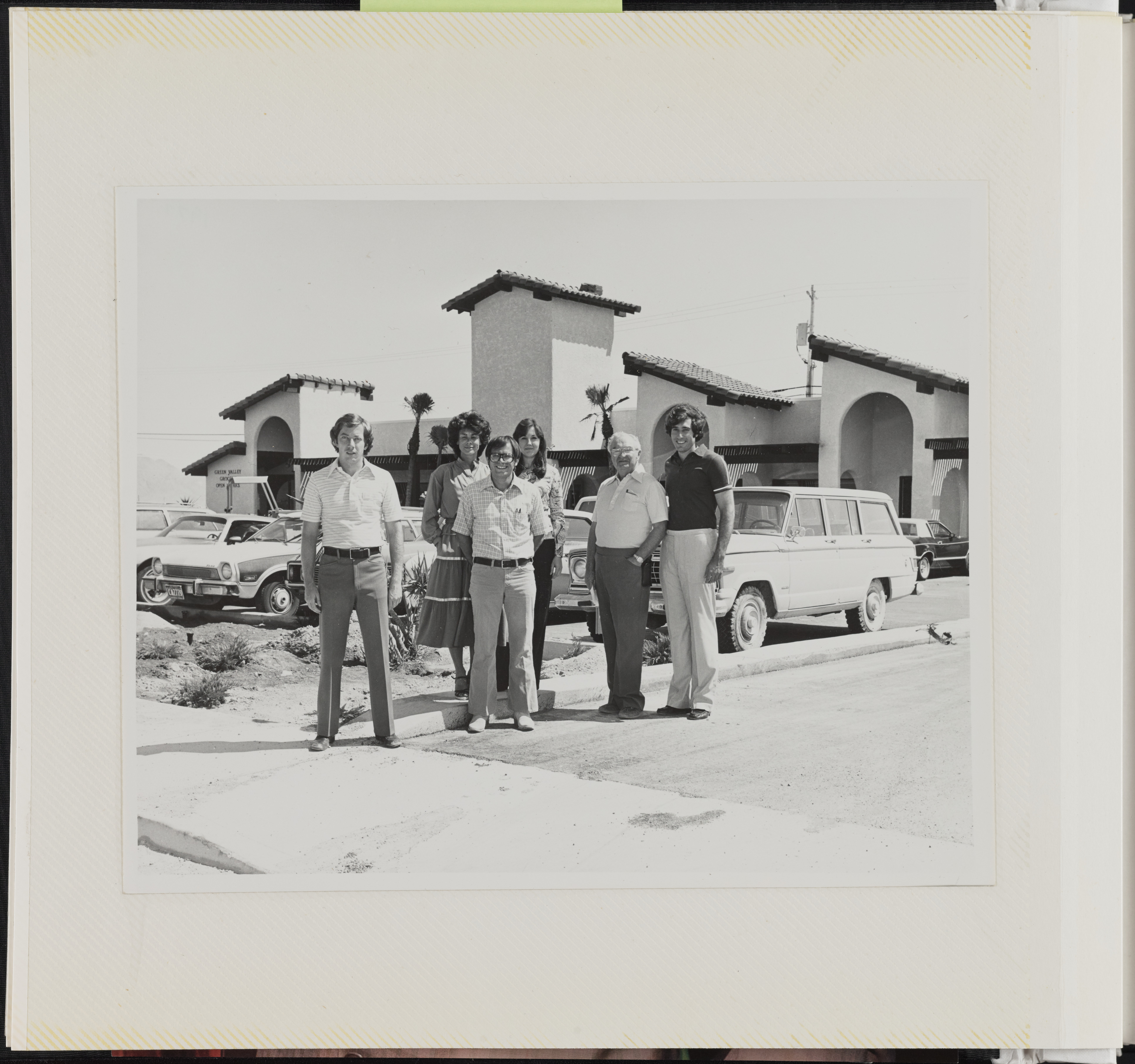Group photograph with Mark Fine outside of Green Valley Grocery